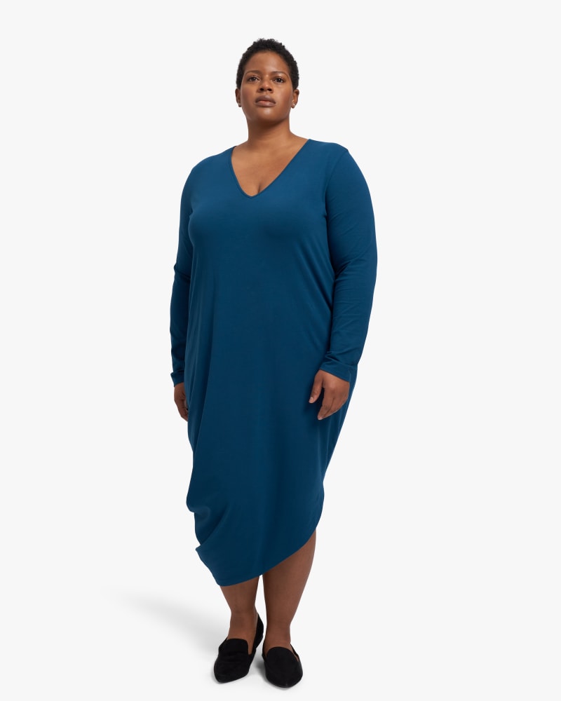 Plus size model wearing Iconic Long Sleeve V-Neck Geneva Dress by Universal Standard | Dia&Co | dia_product_style_image_id:174513